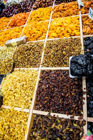 Many varieties of raisins on the counter. Marketの写真素材