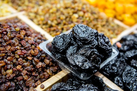 Many varieties of raisins on the counter. Marketの写真素材