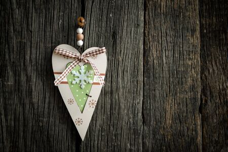 wooden heart on wooden board for valentines dayの写真素材