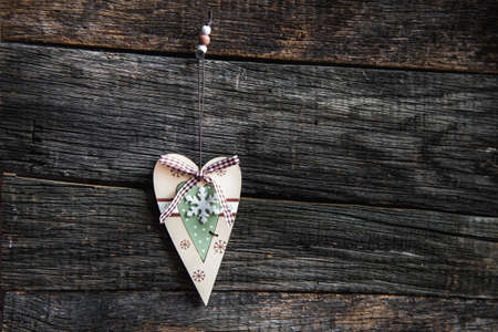 wooden heart on wooden board for valentines dayの写真素材