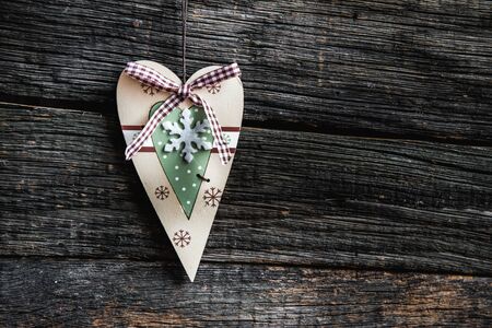 wooden heart on wooden board for valentines dayの写真素材