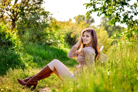 young beautiful girl in a cowboy hat, country styleの写真素材