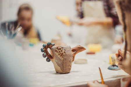 children's hands sculpts clay crafts pottery schoolの写真素材