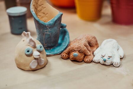 child work, ceramics stands on a shelf and dryの写真素材