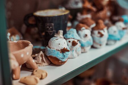 child work, ceramics stands on a shelf and dryの写真素材