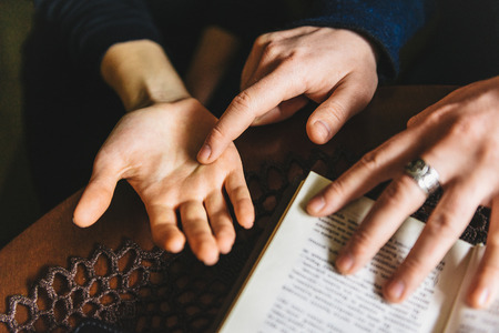 Palmistry concept. Human hand, the value of the lines on the palm. Guessing on the hand linesの写真素材