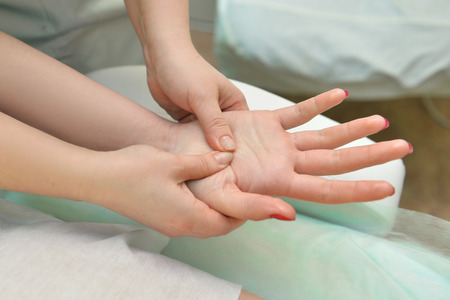 physical therapist massage hands. Hand Massage Su Jokの写真素材