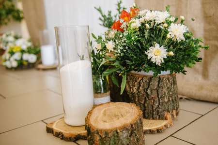 Wedding reception in wooden style and with flowersの写真素材