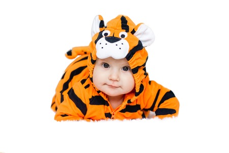 baby wearing tiger suitの写真素材