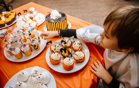Funny meringue ghosts for Halloween partyの写真素材