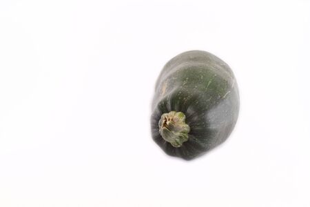green raw marrow isolated on white backgroundの写真素材