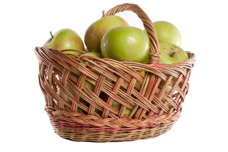 brown basket full of red and green applesの写真素材