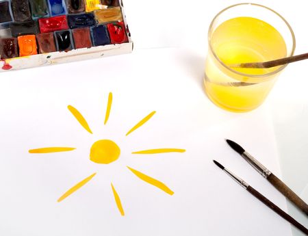 picture of sun with brushes and paintsの写真素材