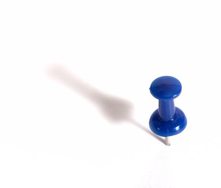 blue push pin isolated on white backgroundの写真素材