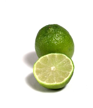 limes isolated on white backgroundの写真素材