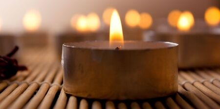 a lot of burning candles