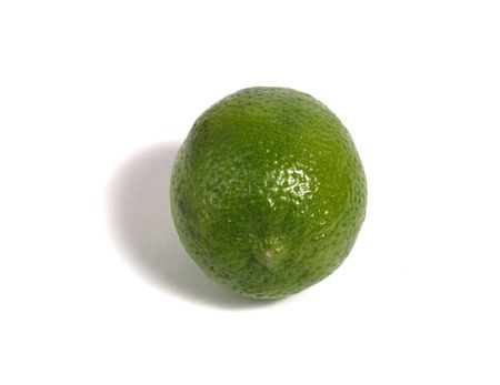 single lime isolated on white backgroundの写真素材