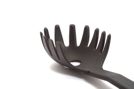 black ladle isolated on white backgroundの写真素材