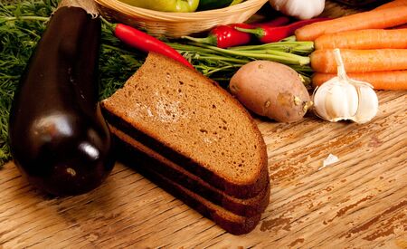 different sorts of vegetables on rural backgroundの写真素材