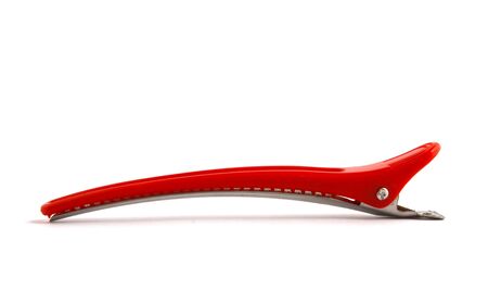 red hair-pin on white backgroundの写真素材