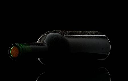 bottle of wine isolated on blackの写真素材