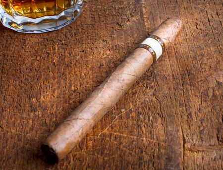 cigar and whisckey on rural backgroundの写真素材