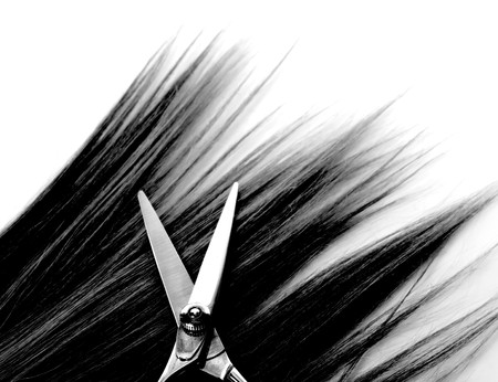 lock of hair and scissorsの写真素材