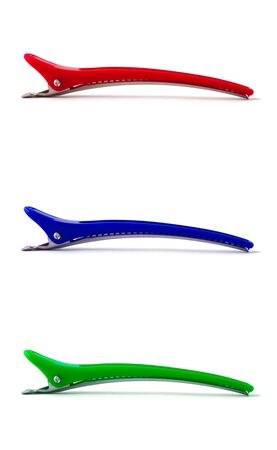 colorful hair-pins on white backgroundの写真素材