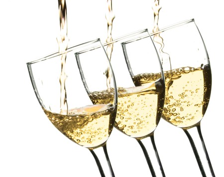 wine pouring into wine glassesの写真素材