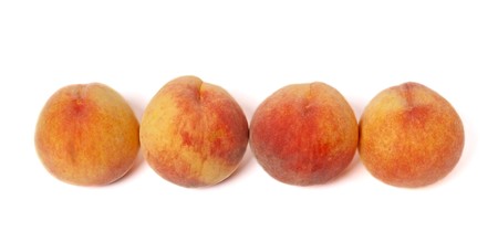 peaches isolated on white backgroundの写真素材