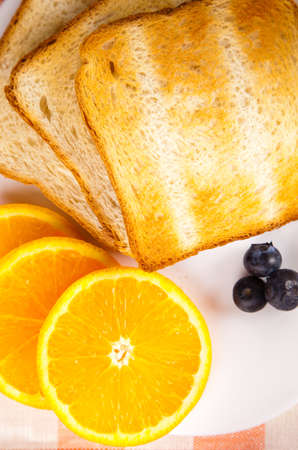 breakfast with toasts and fruits
