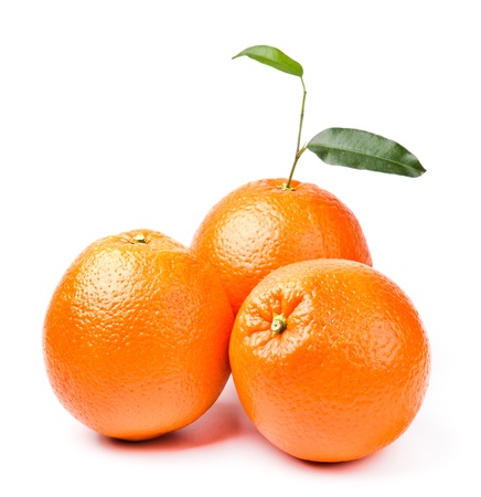 three oranges with leaf isolated on white backgroundの写真素材