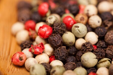 lot of spices in wooden spoonの写真素材