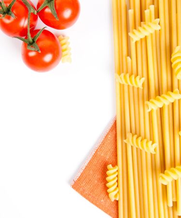 spaghetti and tomatoes on white backgroundの写真素材