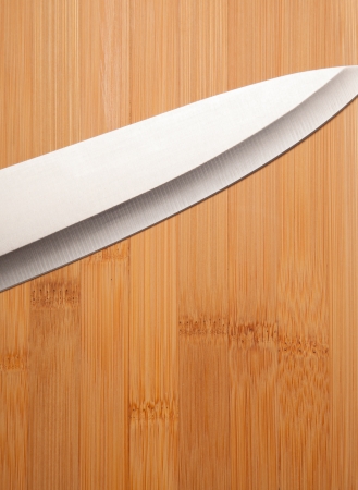 metal knife on cutting board