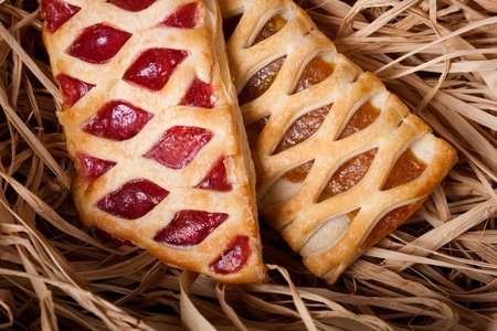 different fresh golden buns in basketの写真素材