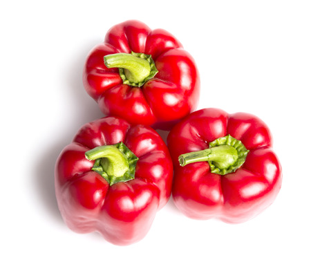 red bell pepper isolated on whiteの写真素材