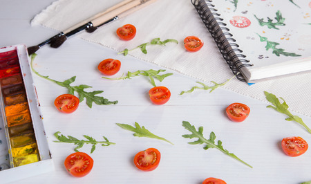 cherry tomatoes ans arugulaの写真素材