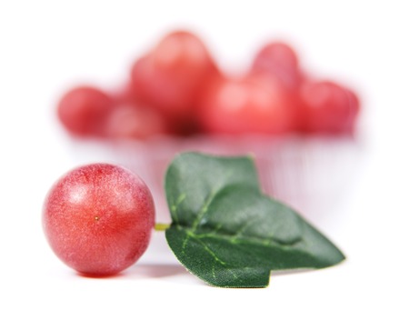 red grapes isolated on white backgroundの写真素材