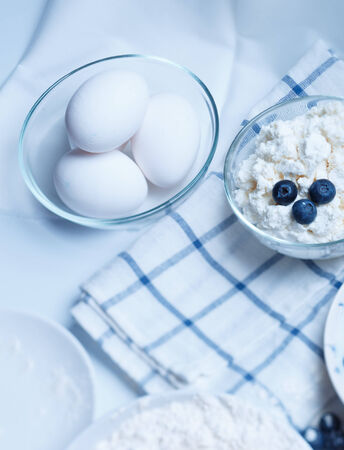 ingredients for cake - meal, eggs, blacberry, sugar and otherの写真素材
