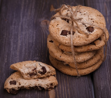 homemade cookies with bow on a wooden table