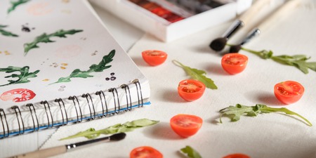 cherry tomatoes ans arugulaの写真素材