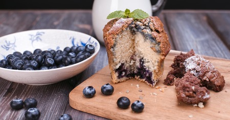 fresh blackberry cupcake with berries and milkの写真素材