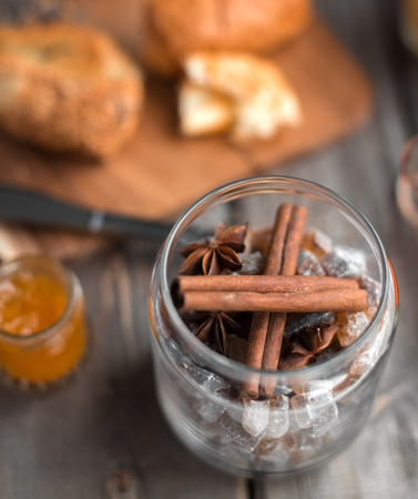 cinnamon and cardamom with sugar in the glassy jarの写真素材