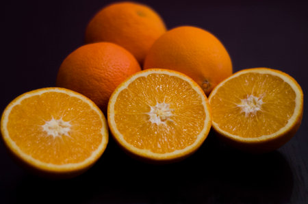 Oranges in blackの写真素材