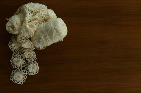 Cream of yarn and knitting backgroundの写真素材