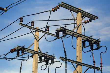 electrical post with blue sky background