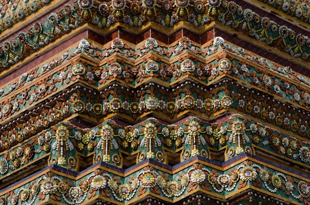 ancient ceramic tiles on the wall of wat pho, bangkok, thailand
