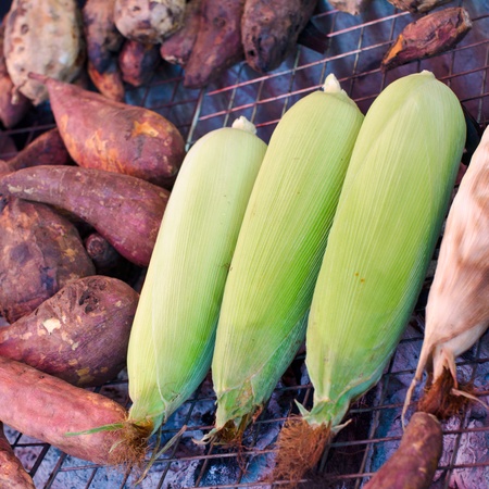 Grilled corn and sweet potatoesの写真素材
