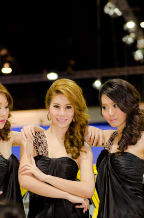 BANGKOK, THAILAND - DECEMBER 6: Unidentified female presenter at Proton booth in THE 28th THAILAND INTERNATIONAL MOTOR EXPO 2011 on December 6, 2011 in Bangkok, Thailand.のeditorial素材